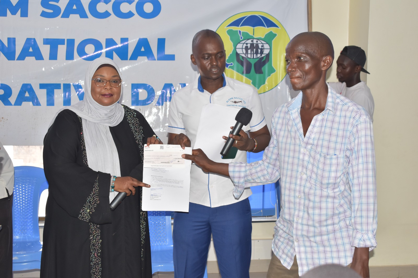 A speaker addressing the audience during certificate issuance