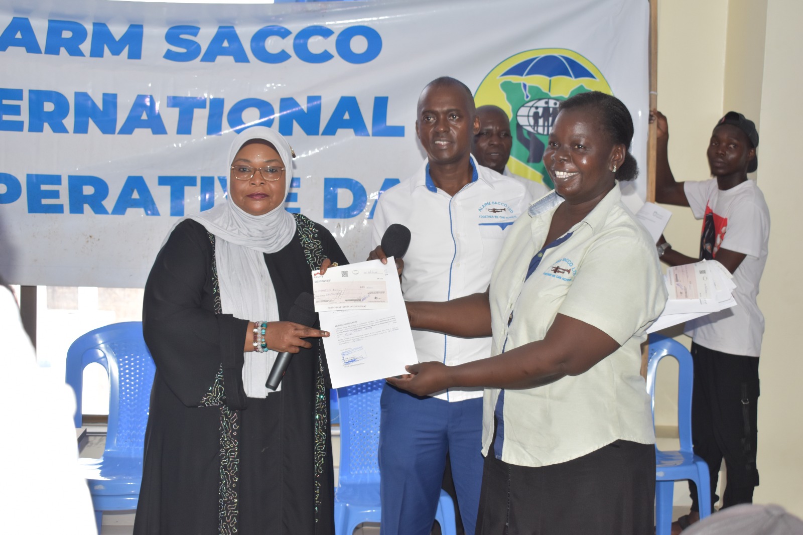 Smiling faces during a certificate event