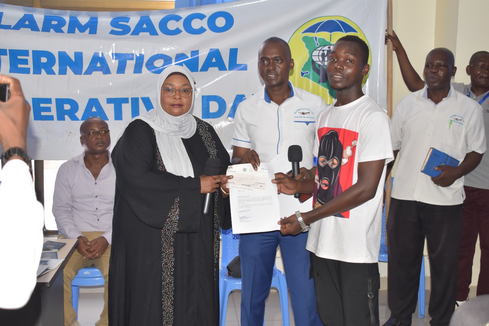 Attendees at a certificate issuance event